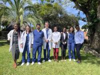 Columbia Nursing students pose with clinicians at Great North Road Academy in Zambia